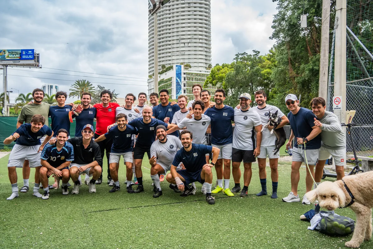 The CFL community together on the pitch with the Miami skyline behind